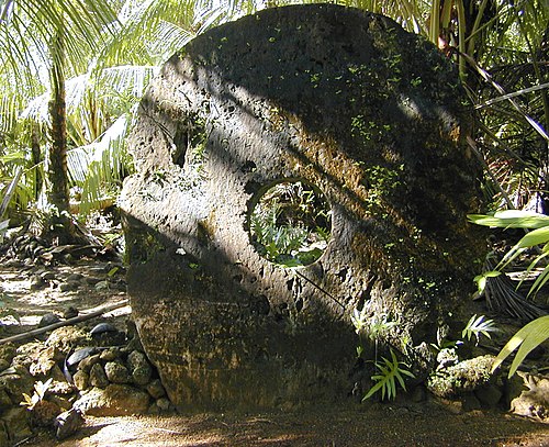 A large (approximately 2.4m \[8 feet\] in height) example of Yapese stone money (Rai)  - Source Wikipedia